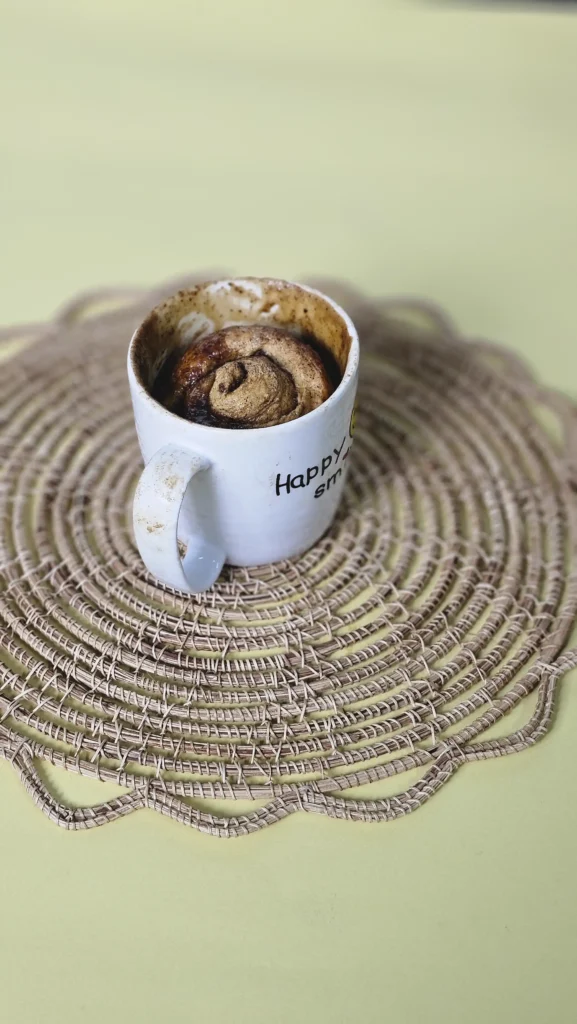 Making cinnamon roll mug cake